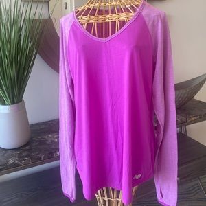 New Balance B-Dry XL purple long sleeve top with thumb holes.